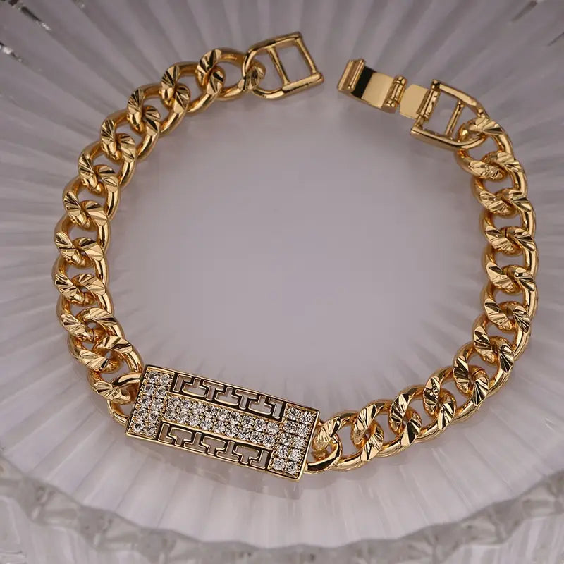 Gold Luxe Twist Bracelet with Crystal Accent